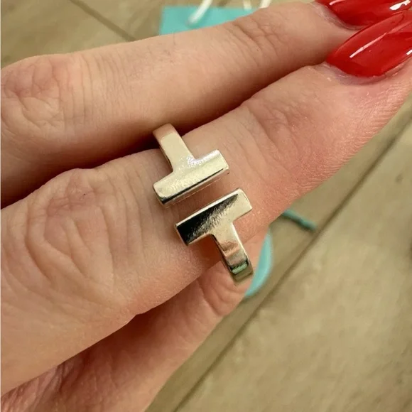 Tiffany & Co. Silver T Design Ring Sz 7
Via - Picture 4 of 10
